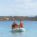 Aqua-Marina-U-Deluxe-inflatable-boat-family-riding-on-boat