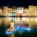 aqua-marina-glow-inflatable-paddleboard-with-light-system-couple-on-water