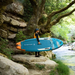 aqua-marina-rapid-river-9-6-inflatable-kayak-man-with-board_3