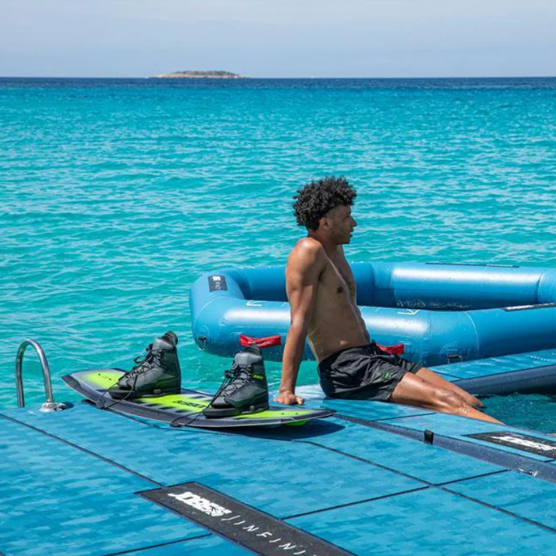 jobe-infinity-inflatable-dock-large-man-sitting-on-platform