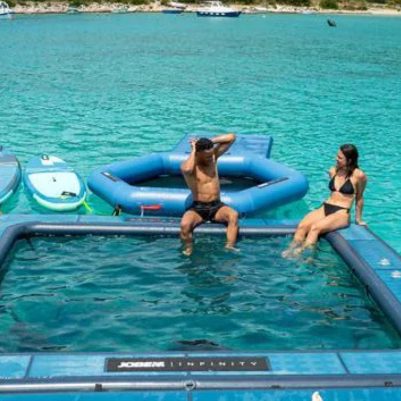 jobe-infinity-pool-with-ladder-couple-in-pool